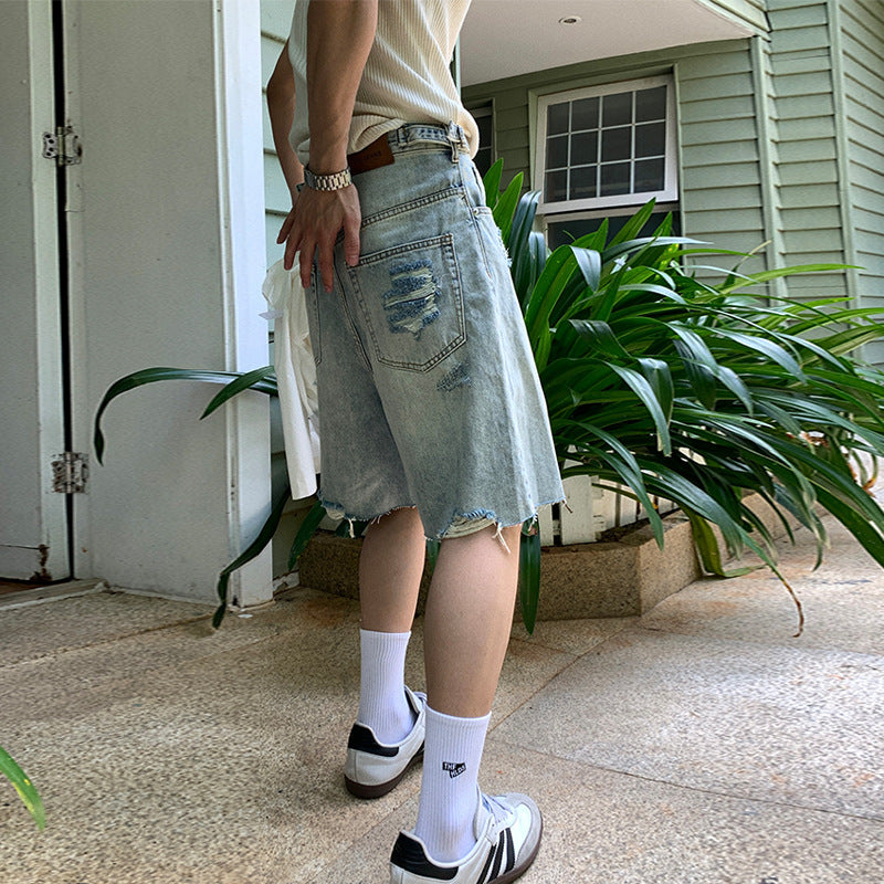 Washed distressed denim shorts for men eprolo