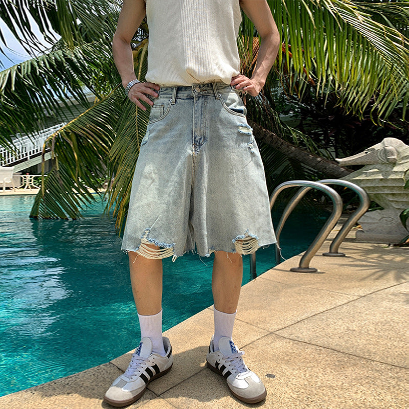 Washed distressed denim shorts for men eprolo
